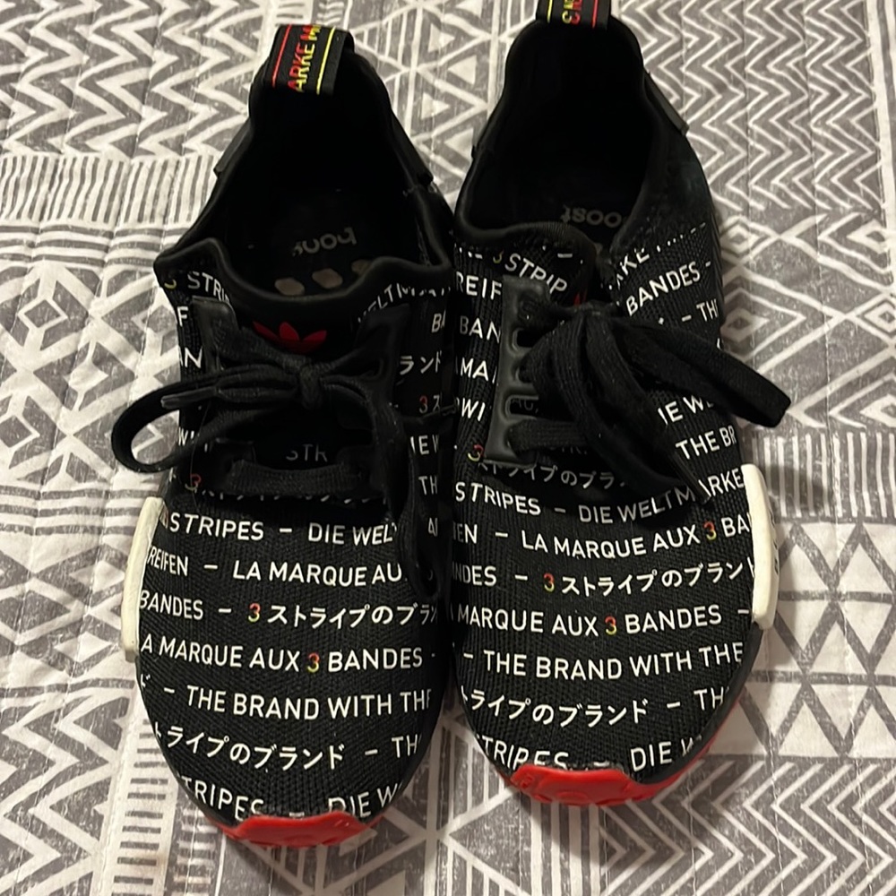 Adidas NMD R1 Berlin Edition Boost BLN Black sneakers.